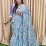 Discover our premium hand-embroidered Semi Muslin saree – a blend of tradition and elegance. Perfect for special occasions, gifts, and timeless styling.