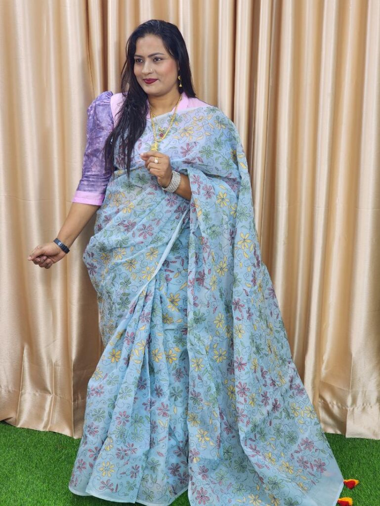Discover our premium hand-embroidered Semi Muslin saree – a blend of tradition and elegance. Perfect for special occasions, gifts, and timeless styling.