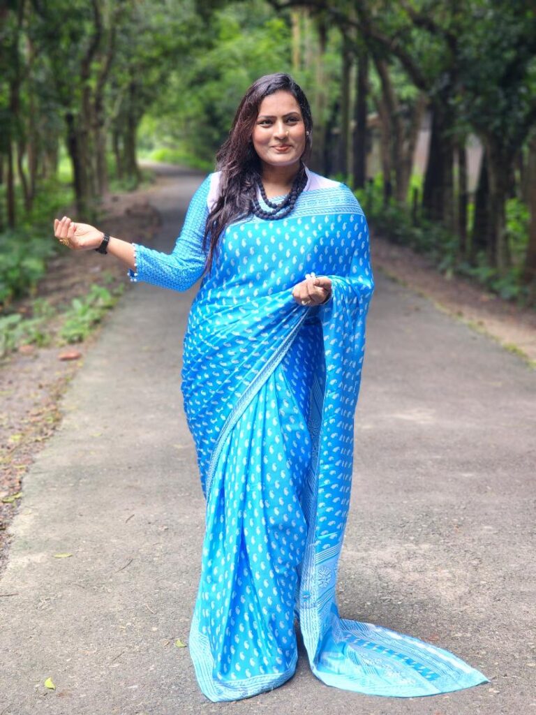 Premium digital-print silk saree featuring vibrant motifs and a matching running blouse piece. Lightweight, smooth drape — perfect for festive and formal wear.